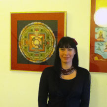 Carmen Mensink in front of her mandala of the Buddha of compassion, Amsterdam, 2011