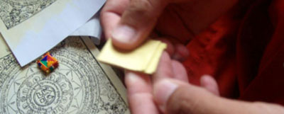 folding-tibetan-buddhist-amulet